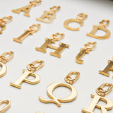 Gold Metal Letter Keyrings (in assortiment)